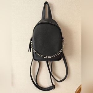 NEVER WARN BLACK MINI BACKPACK